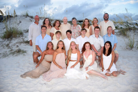 Large family beach portraits taken at the dunes in Panama City Beach