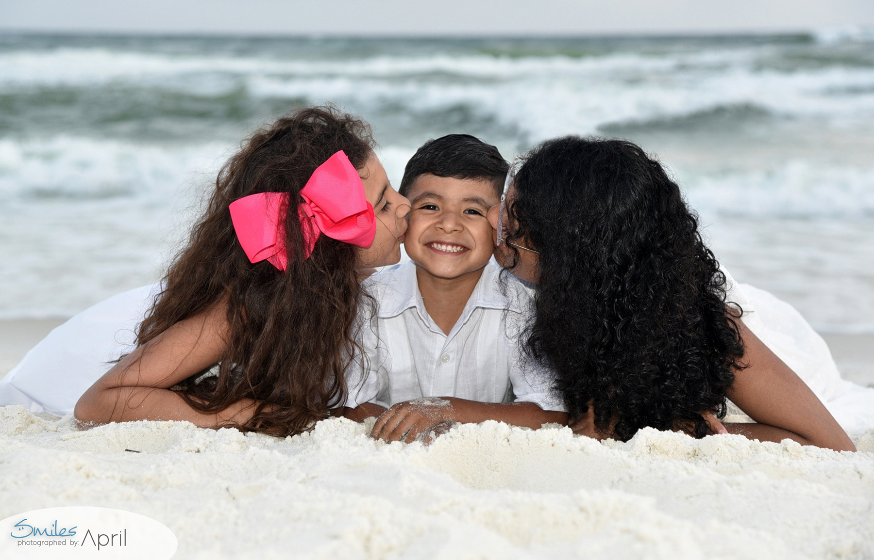 Siblings enjoying their photoshoot with our Panama City Beach photographer.