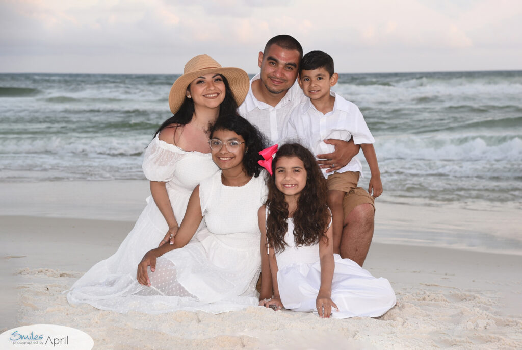 Family photos in Panama City Beach during sunset.